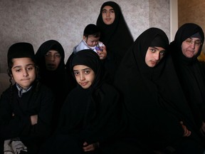 Members of the Jewish fundamentalist group, Lev Tahor, are pictured at the Ramada Limited Windsor, Sunday, Nov. 24, 2013.  Approximately 200 members of the group left their home in Saint-Agathe-des-Monts, Que. for Ontario in the midst of a child neglect investigation.  They plan to settle in Chatham-Kent.  (DAX MELMER/The Windsor Star)