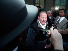 Mike Duggan was elected mayor of Detroit Tuesday, Nov. 5, 2013. Duggan replaces outgoing Detroit Mayor Dave Bing, who chose not to seek re-election, and becomes the first white mayor of Detroit in nearly 40 years. Duggan is shown here being interviewed by the news media after voting at Detroit's 12th Precinct. (Bill Pugliano/Getty Images)