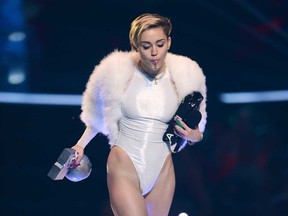 Miley Cyrus performs onstage during the MTV EMA's 2013 at the Ziggo Dome on November 10, 2013 in Amsterdam, Netherlands.  (Photo by Ian Gavan/Getty Images for MTV)