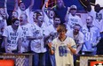 Ryan Riess and his fans react as the river card is turned eliminating Amir Lehavot and advancing him to the final two players during the World Series of Poker Final Table, Tuesday, Nov. 5, 2013, in Las Vegas. (AP Photo/Julie Jacobson)