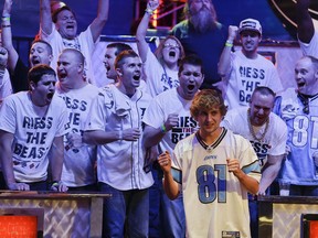Ryan Riess and his fans react as the river card is turned eliminating Amir Lehavot and advancing him to the final two players during the World Series of Poker Final Table, Tuesday, Nov. 5, 2013, in Las Vegas. (AP Photo/Julie Jacobson)