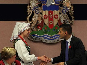 In this file photo, Julia Kulesza greets Windsor Mayor Eddie Francis and Chief Administration Officer Helga Reidel, left, during a presentation for Polish Week 2013 at City Council chambers November 4, 2013. (NICK BRANCACCIO/The Windsor Star)