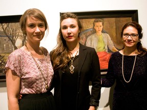 The Saltmarche Soiree and Live Auction, held at the Art Gallery of Windsor on Saturday, Nov. 16, 2013, celebrates the life and artistic collection of Ken Saltmarche, once the head of the AGW. Shown here, Emma, left, and Marra Saltmarche stand with mother Anita Saltmarche in front of a Kenneth Saltmarche painting “Portrait of Judy.” (JOEL BOYCE/The Windsor Star)