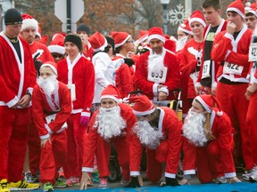 More than 500 runners get set to race along a five-kilometre route for the fifth annual Super Santa Run in Amherstburg, Ont., Saturday, Nov. 16, 2013. (JOEL BOYCE/The Windsor Star)