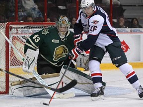 Windsor's Keryby Rychel gets a scoring opportunity in front of London goalie, Anthony Stolarz, as the Windsor Spitfires host the London Knights in OHL action at the WFCU Centre, Sunday, Nov. 10, 2013.  (DAX MELMER/The Windsor Star)