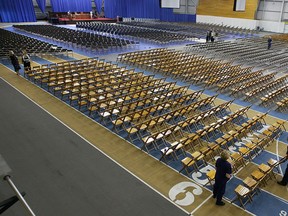 Crews work to set up thousands of chairs at the St. Denis Centre at the University of Windsor on Wednesday May 10, 2006. (Tyler Brownbridge/The Windsor Star)