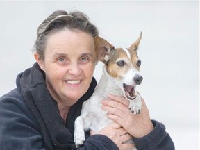 Annie, the counting and talking dog, with owner Terry Lenore, in Vancouver, B.C., November, 26, 2013. (Arlen Redekop, Vancouver Sun)