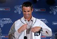 Brad Ausmus is introduced as the new Detroit Tigers manager during a news conference in Detroit Sunday, Nov. 3, 2013. Ausmus replaces Jim Leyland who stepped down as manager. (AP Photo/Paul Sancya)