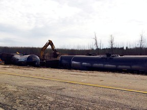 Derailed CN rail cars near Gainford, Alta., in October 2013. (Handout , Transportation Safety Board of Canada)