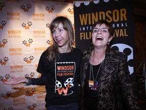 Louise Archambault, left, director of WIFF Opening Night film Gabrielle, poses with WIFF board member Mori McIntosh at the Capitol Theatre in Windsor, Ont., Tuesday November 5 , 2013. (NICK BRANCACCIO/The Windsor Star)