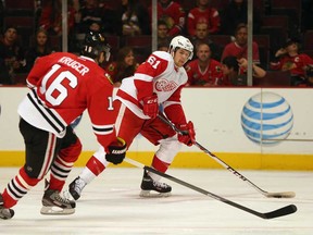 Undated photo of Xavier Ouellet, right, of the Detroit Red Wings. (Google image)