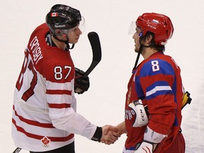 Canada's Sidney Crosby, left, shakes hands with Russia's Alex Ovechkin at the 2010 Olympics. (John Mahoney/Postmedia News)