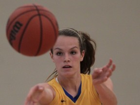 St. Anne's Brielle Loebach passes the ball against Holy Names. (JASON KRYK/The Windsor Star)