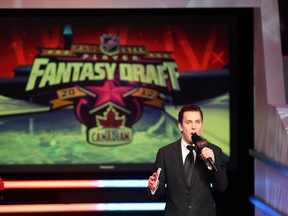 TSN's James Duthie hosts the NHL All-Star Fantasy Draft in Ottawa in 2012. (Photo by Andre Ringuette/NHLI via Getty Images)