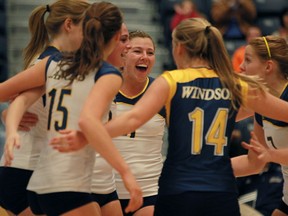 The Windsor Lancers celebrate a point against  the Brock Badgers in OUA women's volleyball at the St. Denis Centre. (DAX MELMER/The Windsor Star)