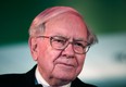 In this file photo, Warren Buffett, Chairman and CEO of Berkshire Hathaway and Co-Chairman of Goldman Sachs 10,000 Small Businesses Program, attends a press conference November 26, 2013 at Ford Field in Detroit. (Bill Pugliano/Getty Images)