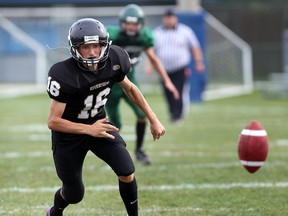 Riverside punter Vlad Bologa races to recover a snap against Lajeunesse in high school football action at Windsor Stadium. (NICK BRANCACCIO/The Windsor Star)