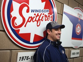 Spitfires head coach Bob Boughner unveils a vintage jersey the Spitfires will wear for the OHL outdoor game at Comerica Park. (DAX MELMER/The Windsor Star)