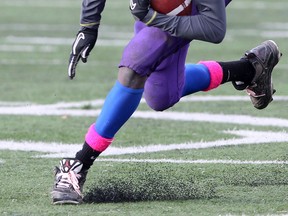 Assumption's Michel Afram-Modi carries the ball Friday against Leamington at Alumni Field. (DAN JANISSE/The Windsor Star)