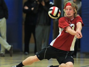 Essex's Mitch Taveirne dives for a ball during the SWOSSAA volleyball final against Walkerville last year. (DAN JANISSE/The Windsor Star)