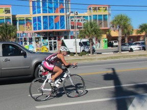 Kelly Steele competes in the bike portion of the Ironman Florida triathlon on Nov. 2. 
(Photo by Stephanie Rhea)