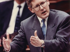 Bob Rae gestures during a debate in the Ontario legislature on June 27, 1991. (Canadian Press files)