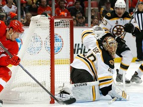 Detroit's Tomas Tatar, left, scores against Bruins goalie Tuukka Rask in Detroit in November 2013. The Wings are glad to have Tatar back in the lineup. (AP Photo/Paul Sancya)