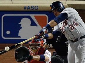 Detroit's Miguel Cabrera hits a double during the MLB All-Star game, on Tuesday, July 16, 2013, in New York. (AP Photo/Frank Franklin II)