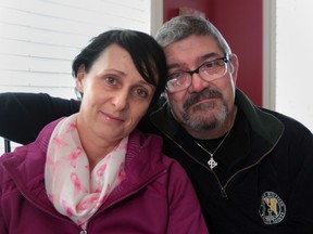 Amanda and Francis Ryall, who both have cancer and are raising young children, are grateful to Windsor contractor Mitch Towsley for fixing their bathroom for free. They thank the outpouring of support during this difficult time.  (JASON KRYK/The Windsor Star)or Star)