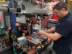 CenterLine's Darcey Renaud assembles a FlexFast welder. (NICK BRANCACCIO/The Windsor Star)