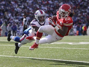 Dexter McCluster, right, of the Kansas City Chiefs is tackled after making the catch during NFL game action by Nickell Robey of the Buffalo Bills on November 3, 2013 in Orchard Park, New York. (Tom Szczerbowski/Getty Images)