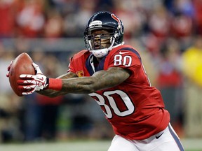 Houston's Andre Johnson catches a touchdown pass against the Indianapolis Colts during the first quarter Sunday, Nov. 3, 2013, in Houston. (AP Photo/David J. Phillip)