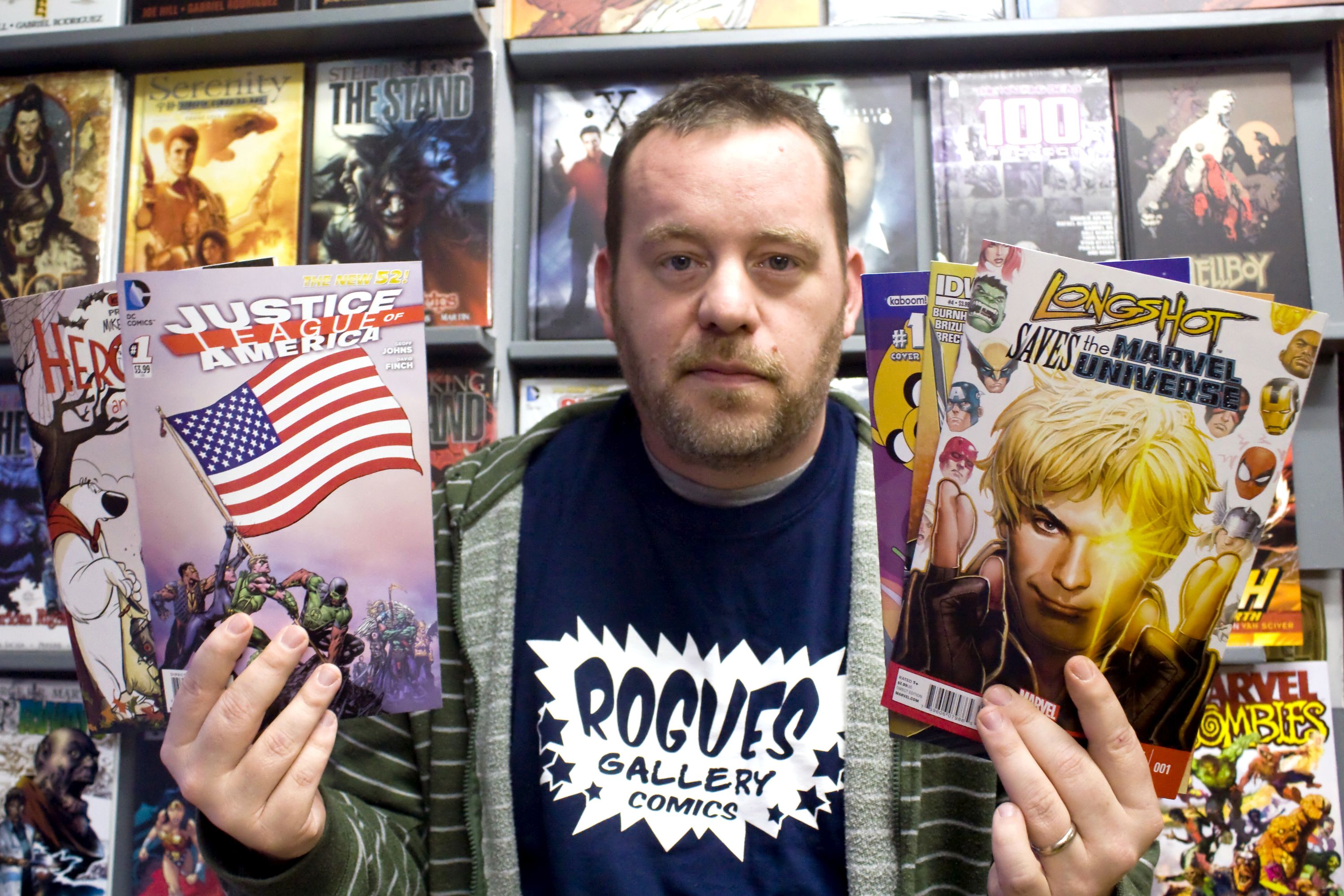 comic-book-store-owner-putting-comics-in-kids-hands-windsor-star