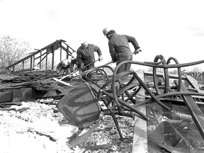 A demolition crew is pictured levelling The Drake Tavern, one of the oldest drinking establishments in Windsor on Feb. 11, 1991. The Drake House, as most regulars called it, closed Dec.27 after spending its final years as a seedy hotel and draft hall. According to the City Directory, a hotel has stood on the Drake Tavern site since at least 1895, when Hanrahan’s House was at the corner of Glengarry and what was then Arthur Street. Leslie Travis and Mario Russo are part of the crew demolishing the structure by hand over the next two weeks. (Rob Gurdebeke/The Windsor Star)