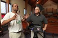 In this file photo from July 2011, Ottawa-based producers Preston Chase, left, and Bob Huggins film a documentary on Emancipation Day at the British Methodist Episcopal Church in Windsor. (DAN JANISSE / Windsor Star files)