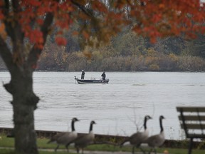 Anglers take advantage of a mild fall day Tuesday, Nov. 5, 2013, near the Sand Point Beach in Windsor, Ont. (DAN JANISSE/The Windsor Star)