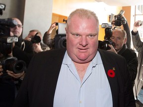 Toronto Mayor Rob Ford arrives to talk on his weekly radio show in Toronto, Sunday, November 3, 2013. THE CANADIAN PRESS/Mark Blinch