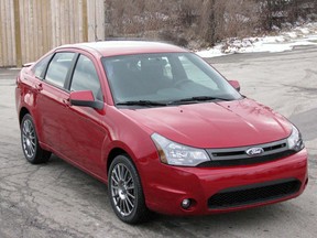 A 2010 burgundy Ford Focus is shown in this file photo. (Graeme Fletcher / Canwest News Service)