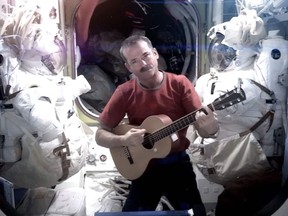 Canadian astronaut Cmdr. Chris Hadfield recorded the first music video from space on May 12, 2013. The song was his cover version of David Bowie's Space Oddity. Hadfield and astronaut Thomas Marshburn returned to earth on  May 13, 2013. (Courtesy of NASA)