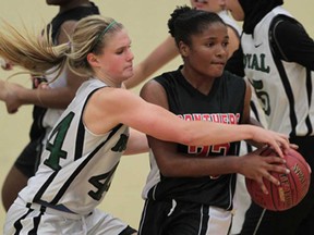 Lajeunesse's Jenna Henry, left, battles Maranatha's Jade Griffiths during the WECSSAA senior girls A basketball final at Lajeunesse. The Royals beat the Panthers 53-25. (JASON KRYK/The Windsor Star)