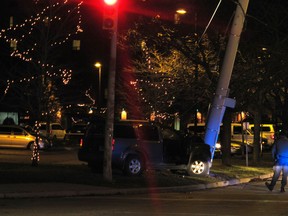 A Toyota SUV hit an electricity pole late Friday night after a chase down Huron Church Road with OPP. (Monica Wolfson/The Windsor Star)
