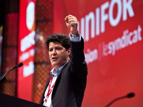 In this file photo, Jerry Dias gives a speech after being declared the first president of Unifor at the founding convention in Toronto on Aug. 31, 2013. (THE CANADIAN PRESS/Galit Rodan)