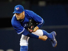 Blue Jays pitcher Josh Johnson throws against the Houston Astros July 27, 2013 in Toronto. (THE CANADIAN PRESS/Jon Blacker)