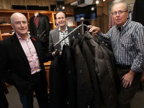 Gary Hillier, Barry Smith and Gerry Osborne, of The Men's Store, are closing the downtown retail outlet once the stock is sold. (TYLER BROWNBRIDGE/The Windsor Star)