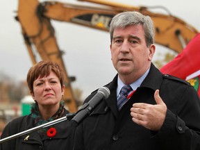 Ontario's Minister of Transportation Glen Murray (R) and Windsor West MPP Teresa Piruzza (L) hold a press conference on the parkway project's girder controversy, Nov. 1, 2013. (Dax Melmer / The Windsor Star)