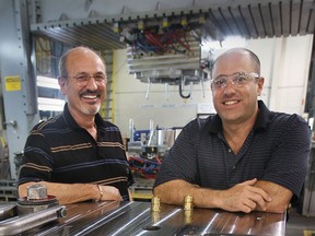 Euclide Cecchin and his son Dave Cecchin, on July 28, 2010, are the owners of the family buisness Omega Tool Corp. in Windsor and one of the top five tool companies in the country. (Dan Janisse/The Windsor Star)