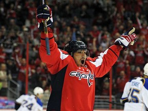 Washington's Alex Ovechkin celebrates after scoring his second goal of the first period against the St. Louis Blues at the Verizon Center on November 17, 2013 in Washington, DC. (Patrick Smith/Getty Images)