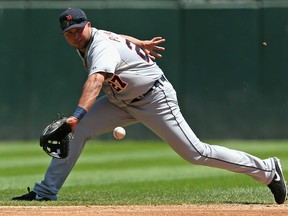 Detroit's Jhonny Peralta fields a ball against the White Sox July 25, 2013 in Chicago. Peralta has signed with Cardinals. (Jonathan Daniel/Getty Images)