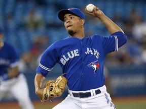 Toronto pitcher Juan Perez throws against the Houston Astros on July 27, 2013 at Rogers Centre in Toronto. (Tom Szczerbowski/Getty Images)