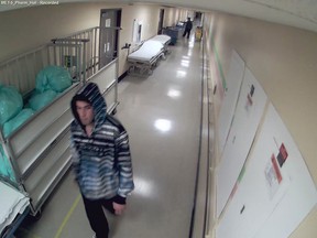 A suspect wanted in connection with a purse theft at Windsor Regional Hospital Metropolitan Campus is pictured in this surveillance photo. (HANDOUT/The Windsor Star)